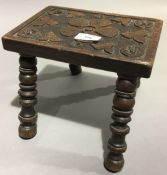 A small 19th century carved oak stool