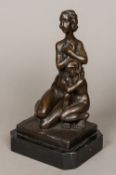 A contemporary bronze group Worked as a mother and child standing on a black marble plinth base.