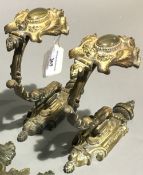 A pair of 19th century large curtain tie backs