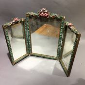 A vintage florally decorated triptych mirror
