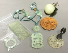 A quantity of jade pendants, etc.