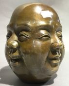 A four faced Buddha's head