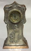 An embossed silver cased mantel clock