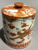 A Japanese porcelain jar and cover,