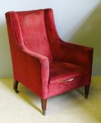 A Victorian red upholstered armchair