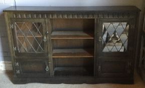 A glazed oak bookcase