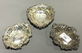 Three silver dishes