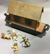 A vintage toy arc and a small quantity of various animal figures
