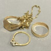 Three 9 ct gold rings and a 9 ct gold chain (8.