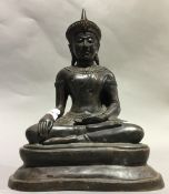 A bronze model of Buddha