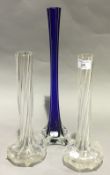 A pair of Victorian twisted glass vases and a blue glass vase