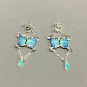 A pair of silver and enamel butterfly earrings