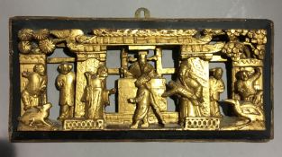 A Chinese gilt carved wood temple panel