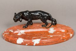 An Art Deco bronze mounted desk stand Worked with the figure of a panther,