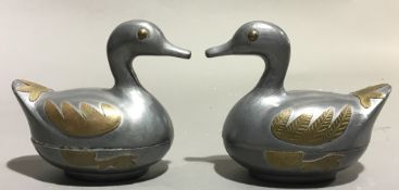 A pair of Chinese pewter ducks