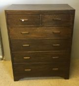 An early 20th century oak chest of drawers