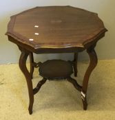 An Edwardian inlaid mahogany centre table