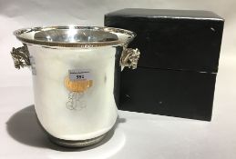 A Louis Roederer silver plated champagne bucket with horse's head handles,