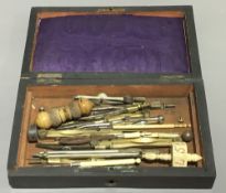 A Victorian rosewood cased set of drawing implements, etc.