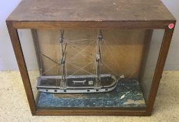 A cased ship diorama