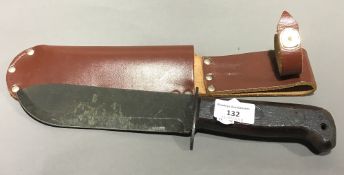 A survival knife in leather sheath, Special Forces,