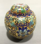 A Chinese enamel and golden ginger jar and cover
