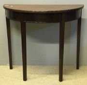 A mahogany demi lune side table