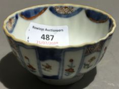 A Chinese porcelain doucai wine cup (AF)