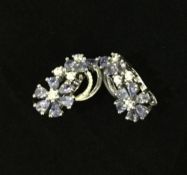 A pair of silver and tanzanite earrings