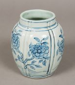 An Eastern blue and white porcelain vase Decorated with floral sprays. 15.5 cm high.