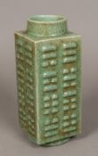 A Chinese celadon ground Kong vase Of typical form, with multi-lobed sides. 29 cm high.