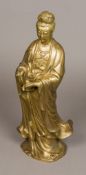 A Chinese gilt bronze figure of Guanyin Typically modelled. 48 cm high.