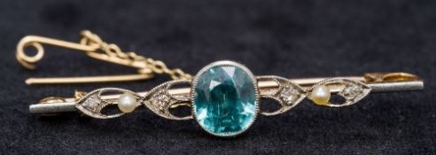 A 15 ct gold and platinum bar brooch Set with central aquamarine flanked by four small diamonds and