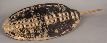 A South African Zulu ishilunga Typically worked with woven decoration. The shield 82 x 44 cm.