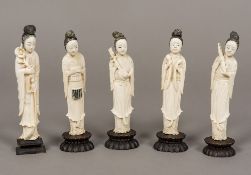 A set of four 19th century carved ivory figures of Guanyin Each modelled holding a different