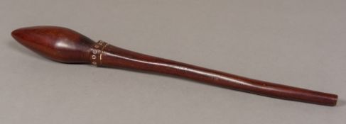 A South Pacific carved hardwood club With torpedo finial and geometric decoration. 52.5 cm long.
