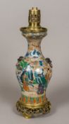 A 19th century Chinese crackle glaze vase Of slender bulbous form with dog-of-fo mask and loop