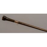 A 19th century carved bamboo walking stick With monkey worked handle; together with another,