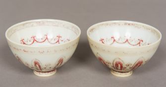 A pair of Chinese Yuan porcelain bowls Each decorated in iron red with geometric bands. 5.