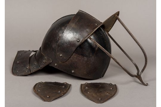 A 17th century English Civil war tri-bar lobster pot helmet The two piece skull with raised medial