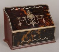 A Victorian unmarked silver and tortoiseshell mounted stationery box The hinged shaped lid inset