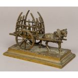 A 19th century bronze group of a horse and hay cart Naturalistically modelled,