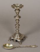 An unusual 18th century Continental silver candlestick With scalloped drip pan,