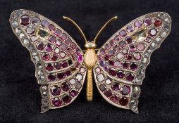 An unmarked gemstone set brooch Formed as a butterfly. 6.5 cm wide.