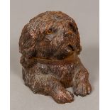 A Black Forest carved wooden inkwell Formed as a dog, the hinged head with glass inset eyes,