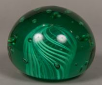 A good large Victorian green glass dump weight Typically worked with inclusions and air bubbles.