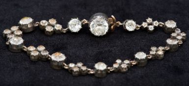 A Georgian unmarked gold, silver and paste set bracelet 18.5 cm long.