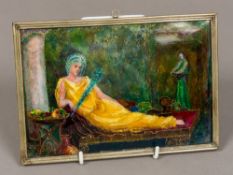 An Art Nouveau Limoges type enamel plaque Depicting a reclining lady in classical dress before an