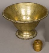 A large Eastern bronze footed bowl; and an Indian brass box formed as a female bust. The bowl 32.