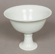 A Chinese porcelain stem cup The bowl with Anhua decoration and four character Yongle mark.